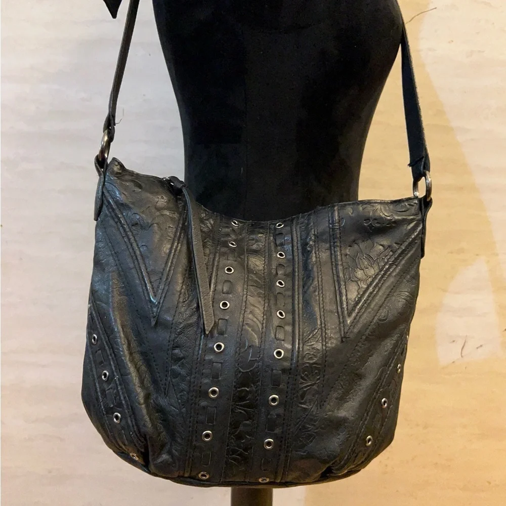 Vintage Cabin Creek Paisley Embossed genuine leather handbag grommet detailing